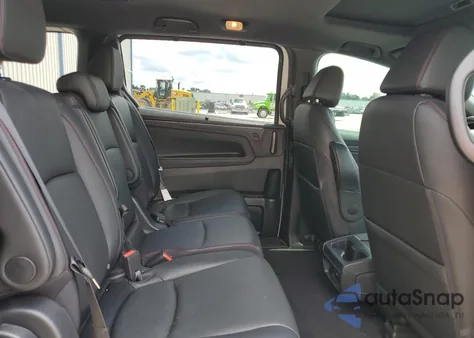 2023 Honda Odyssey Sport-L z USA, uszkodzony, nr VIN 5FNRL6H79PB045226